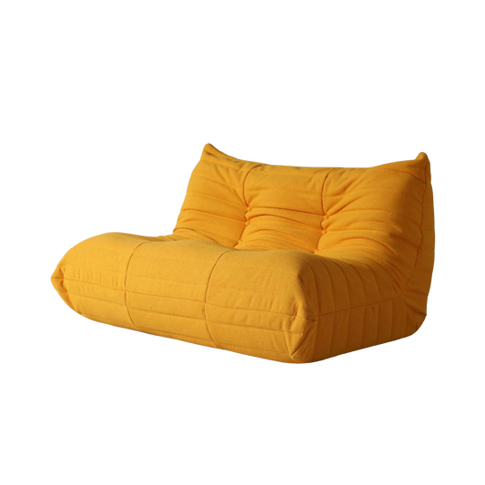 Yellow bean bag chair on a white background