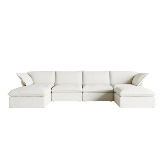 White sectional U-shaped sofa on a white background