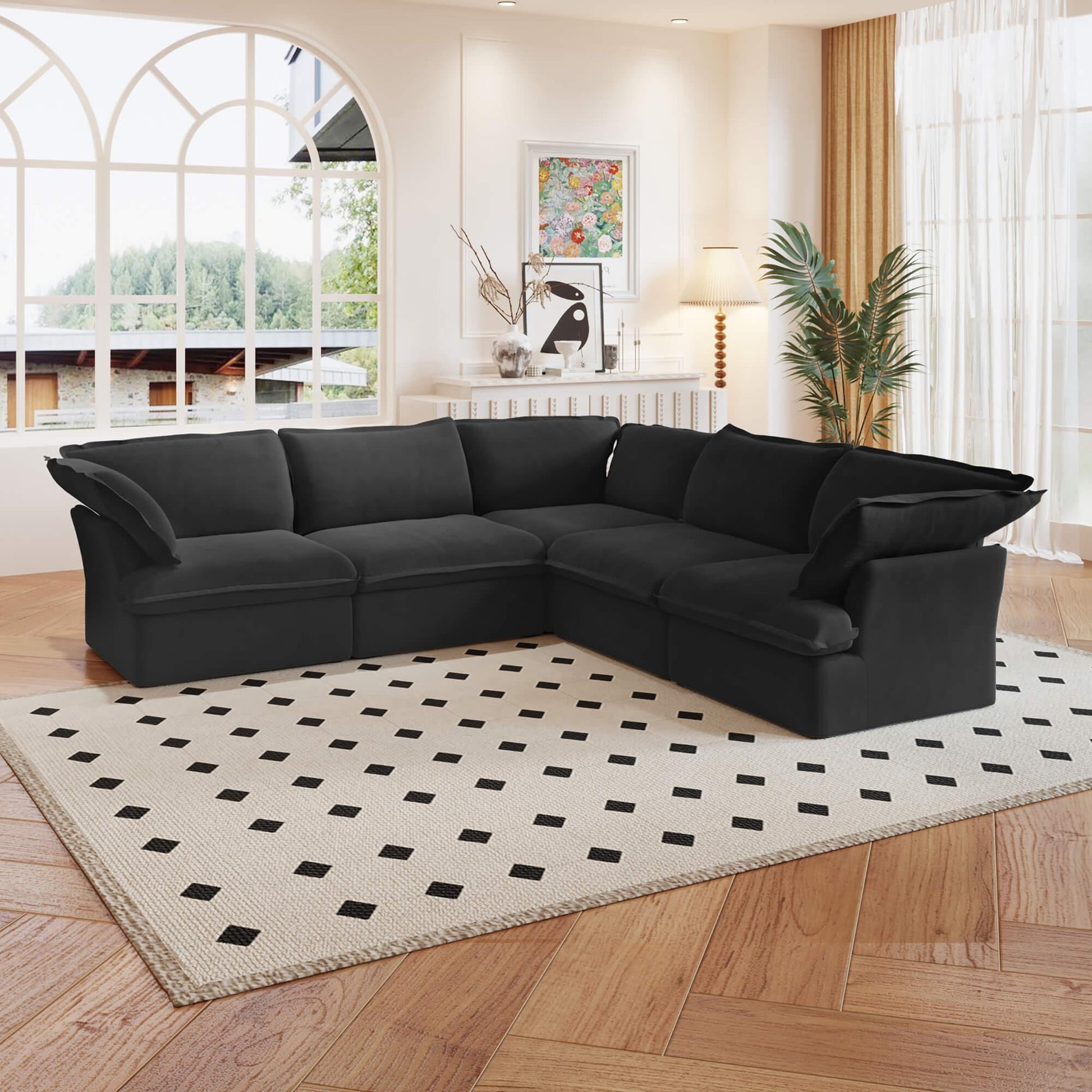 A black 5-piece corner linen sectional sofa arranged in a living room setting with a patterned rug on the floor.