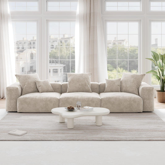 A beige corduroy 3-seat sectional modular sofa with detachable armrests and removable covers, pet-friendly, displayed in a bright living space.