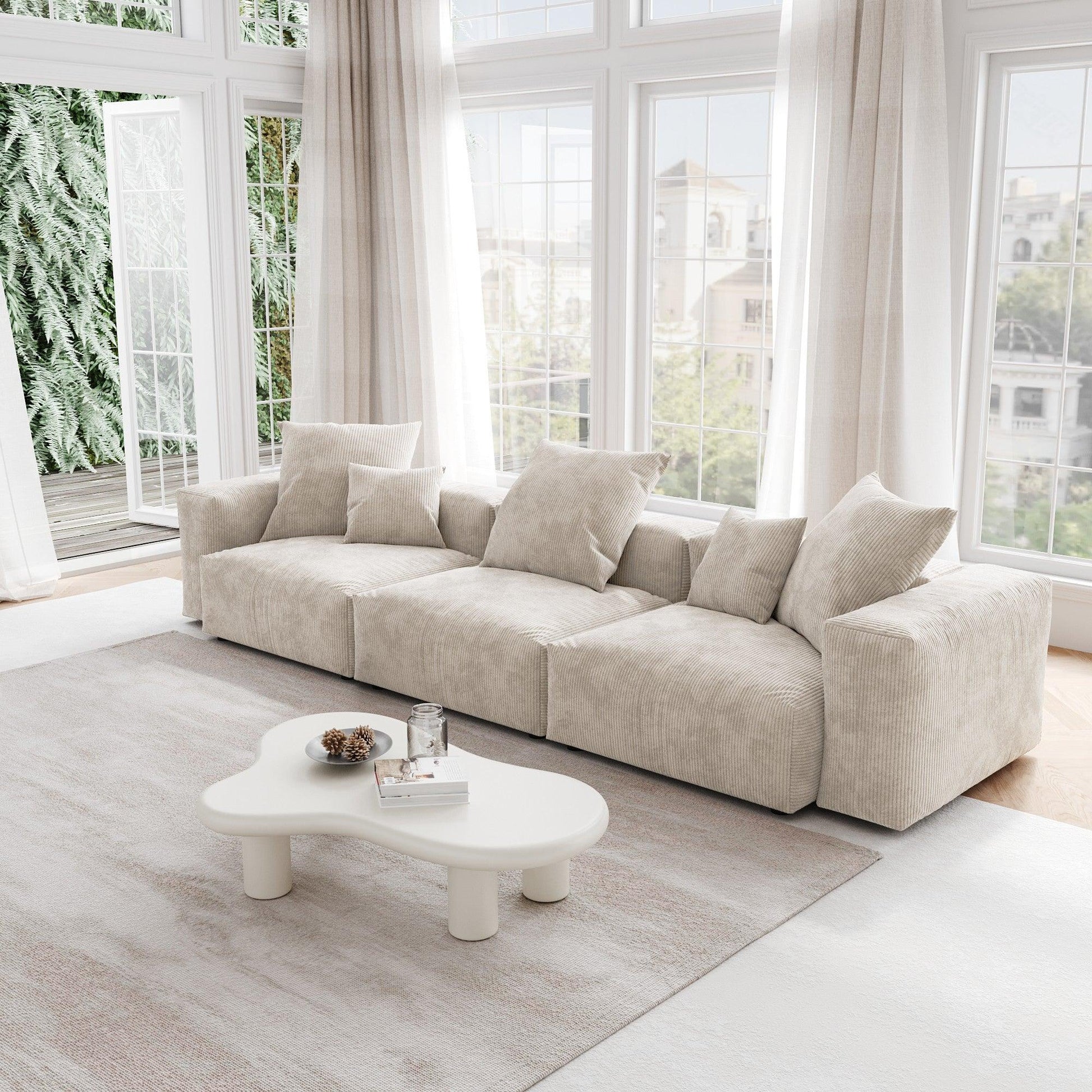 A beige corduroy sectional 3-seat sofa with detachable armrests and removable covers, pet-friendly, displayed in a bright living space.