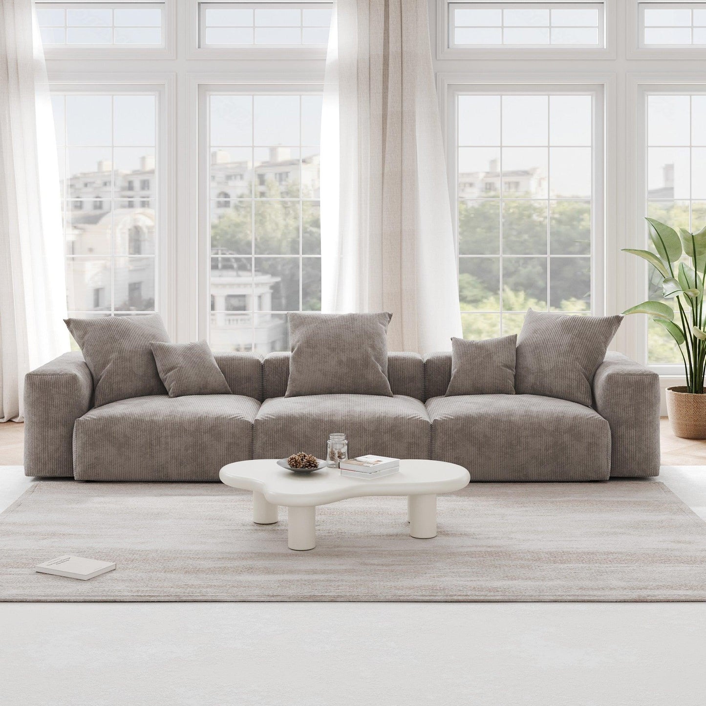 A brown corduroy 3-seat sectional modular sofa with detachable armrests and removable covers, pet-friendly, displayed in a bright living space.