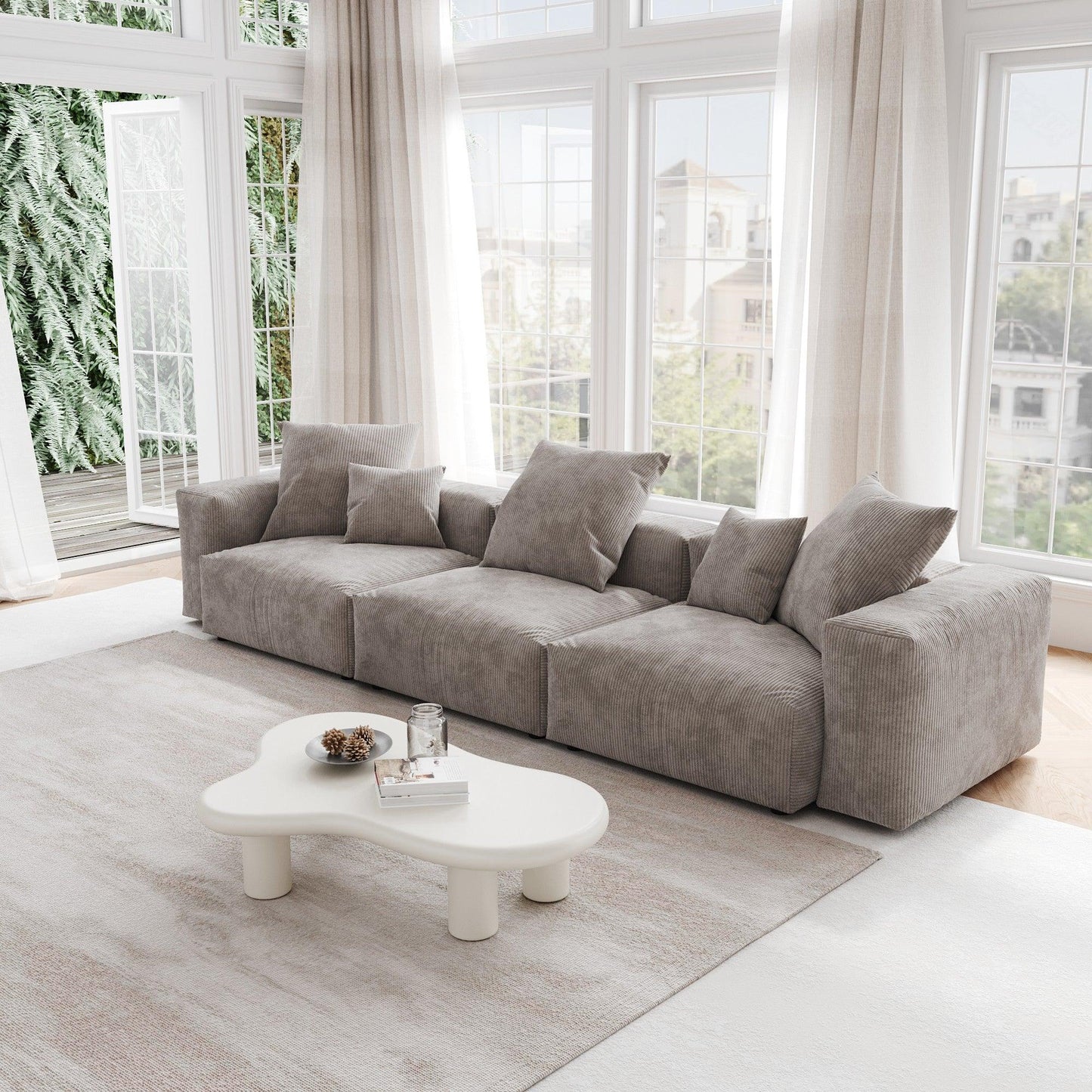 A brown corduroy 3-seat sectional modular sofa with detachable armrests and removable covers, pet-friendly, displayed in a bright living space.