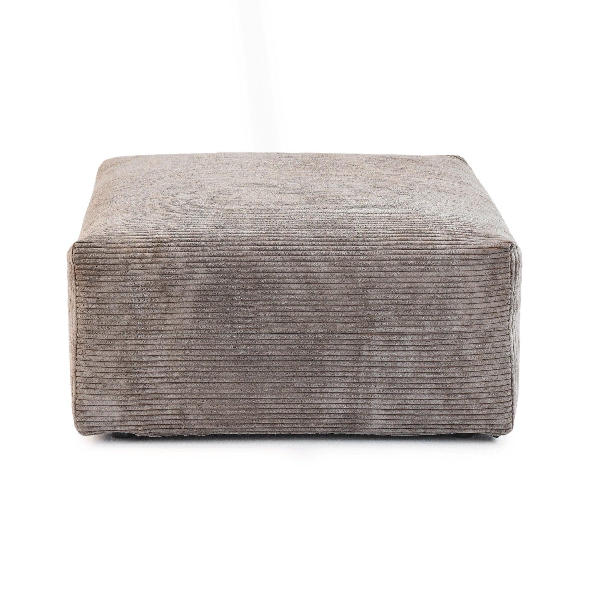 A brown corduroy modular ottoman with removable covers, presented in a minimalist style against a white background.