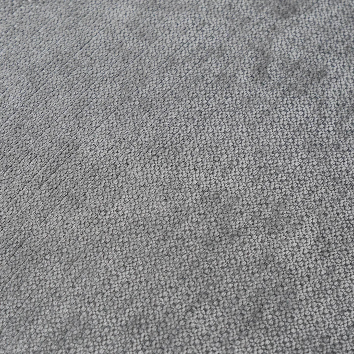 Close-up of gray linen fabric of a sofa