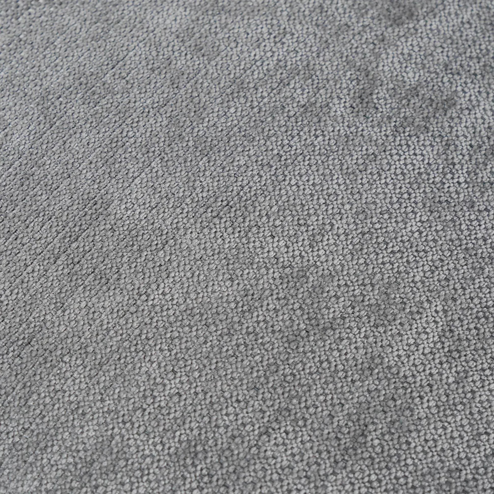 Close-up of gray linen fabric of a sofa