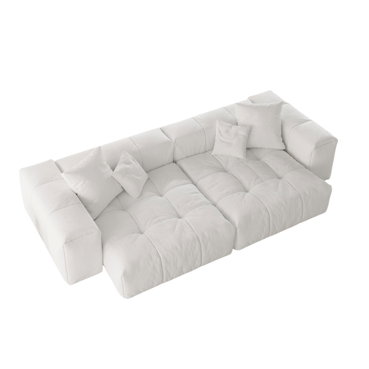 White loveseat sofa with tufted design on a white background
