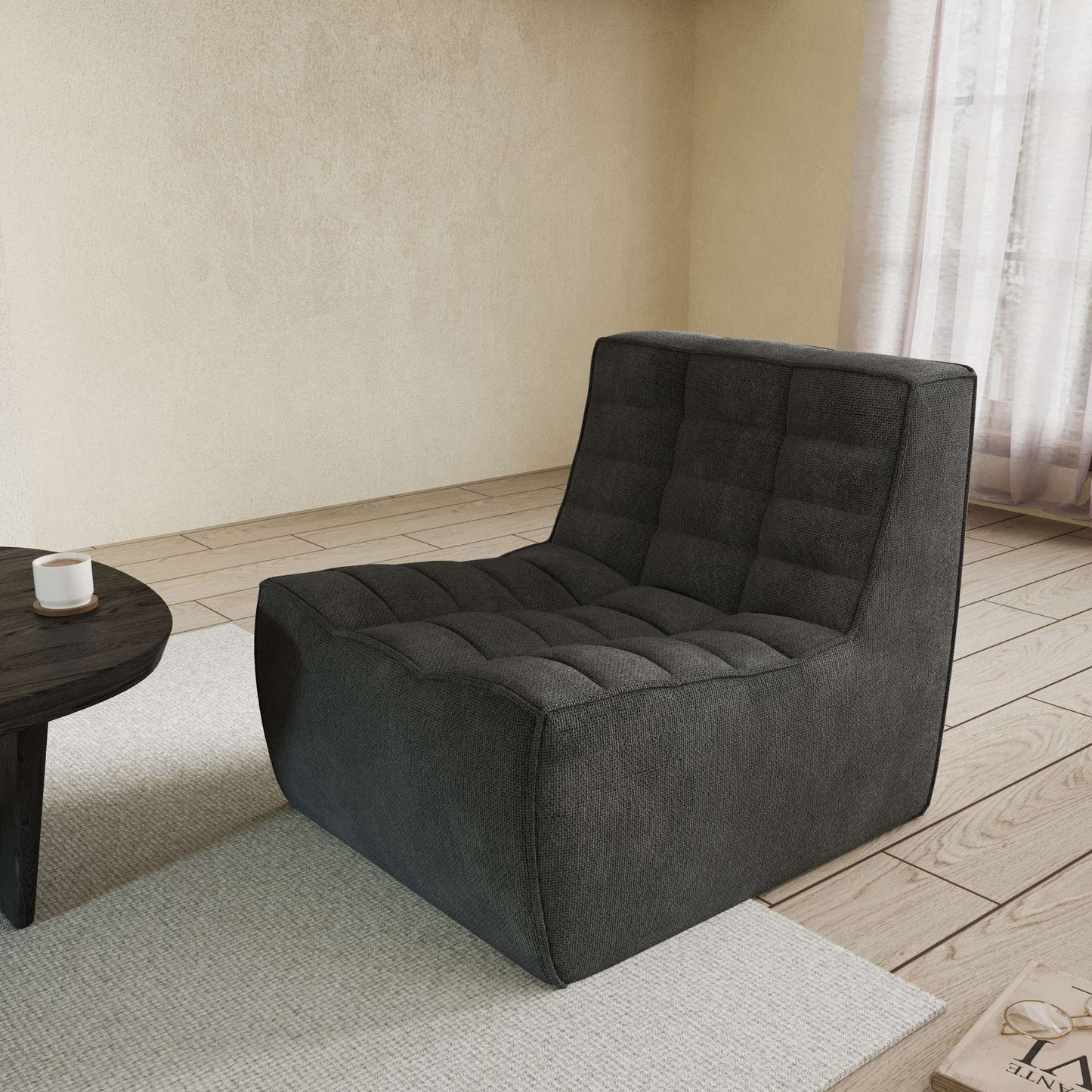 A black chenille accent chair with a minimalist design