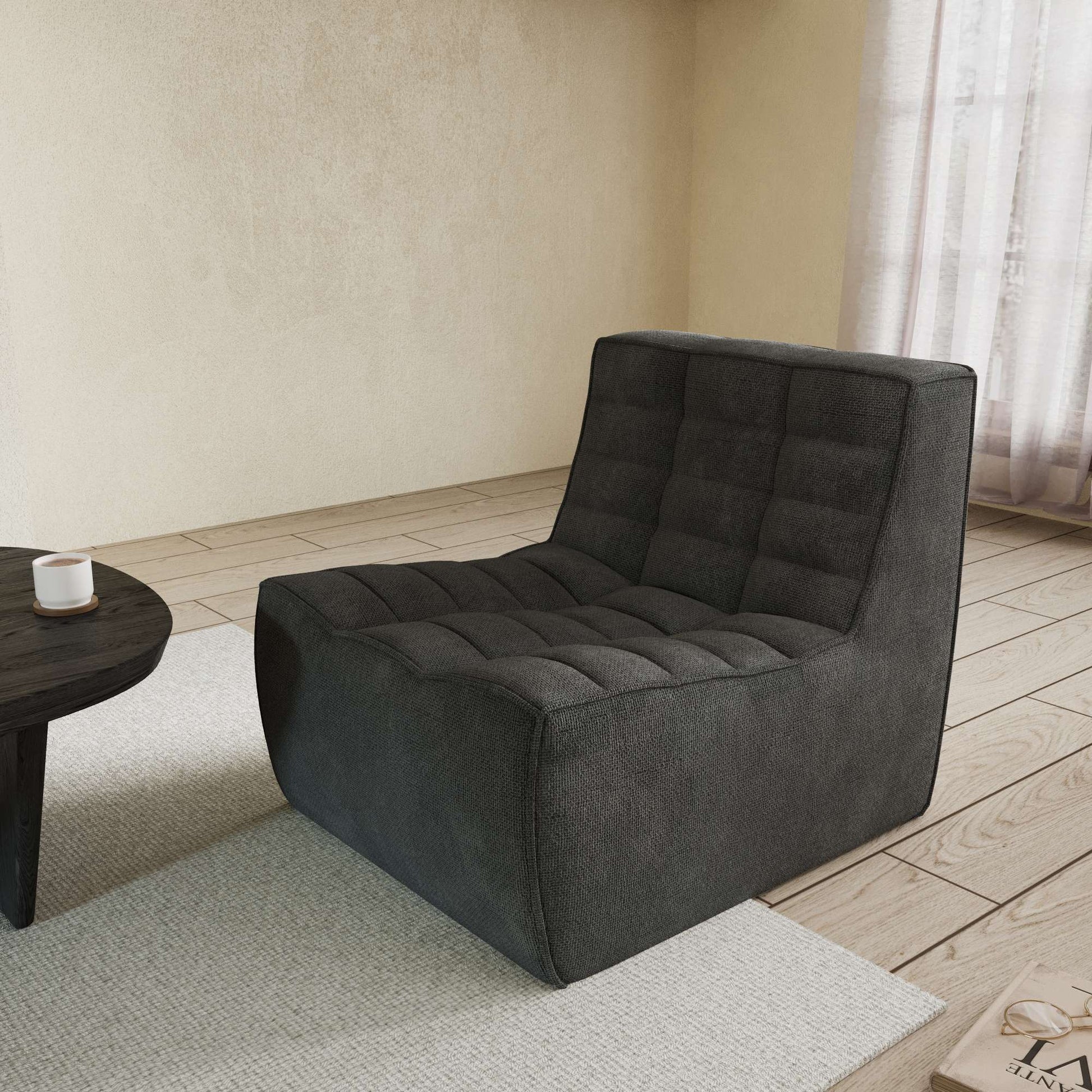 A black chenille accent chair with a minimalist design