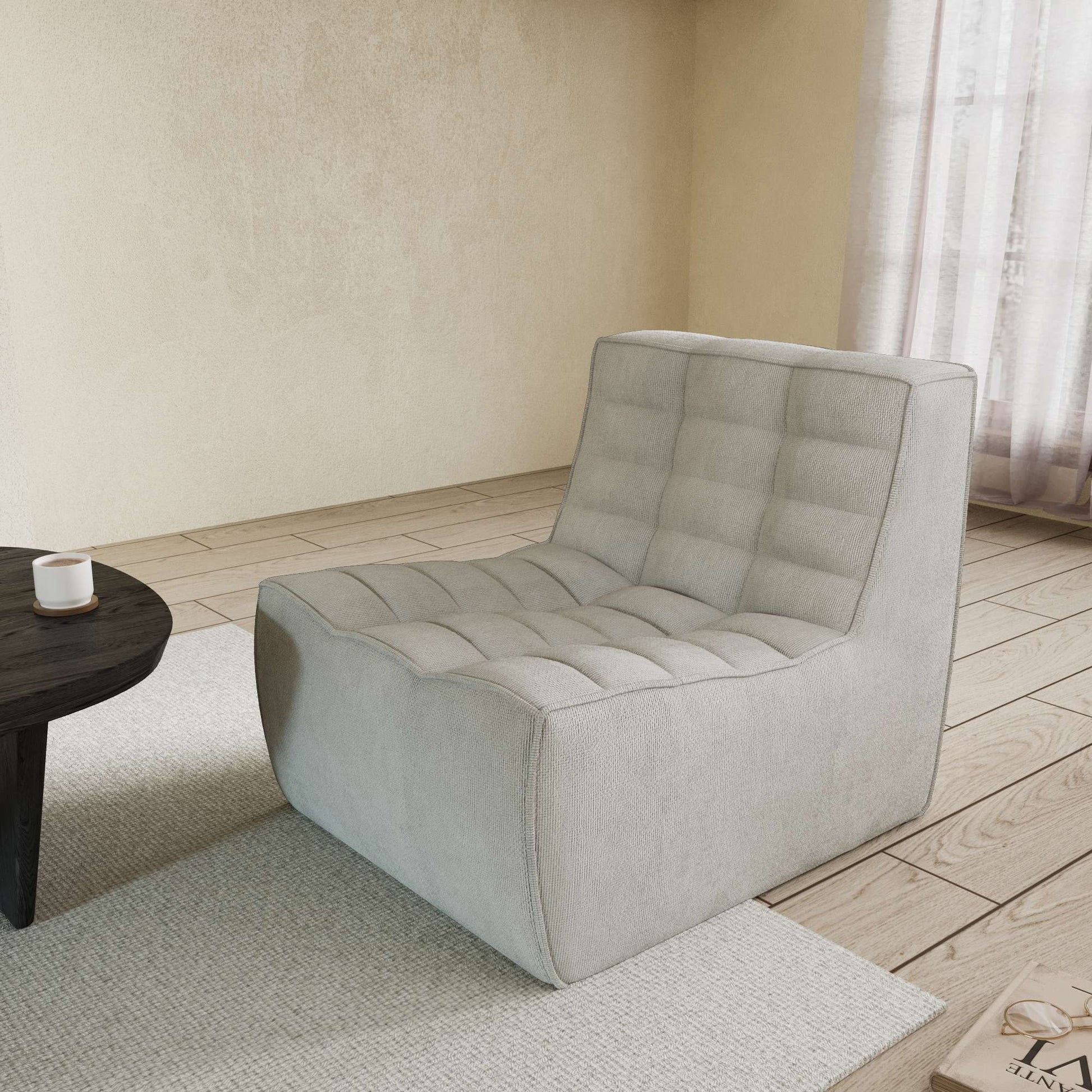 A light gray chenille accent chair with a minimalist design