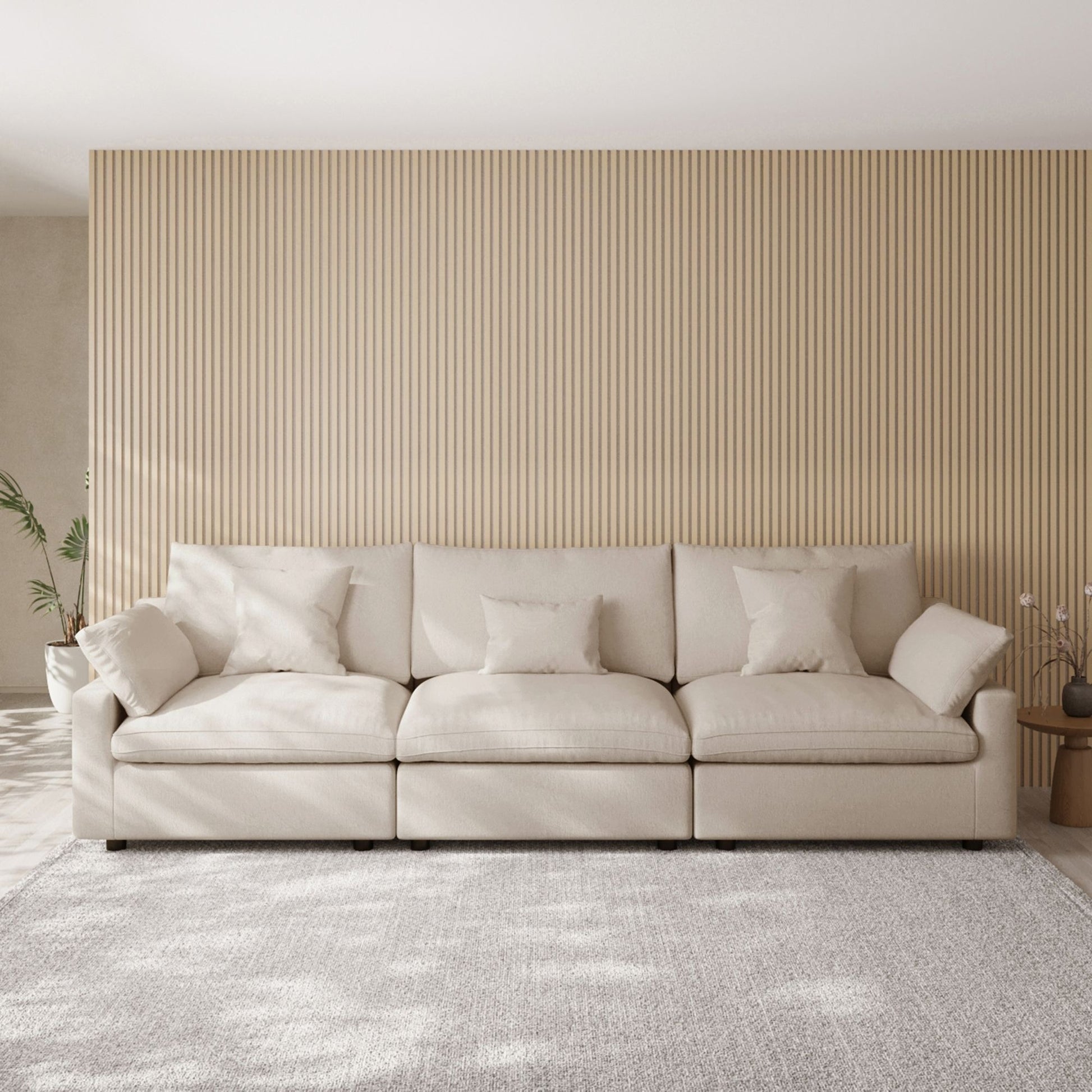 Khaki 3-seater sofa in a room with striped wallpaper