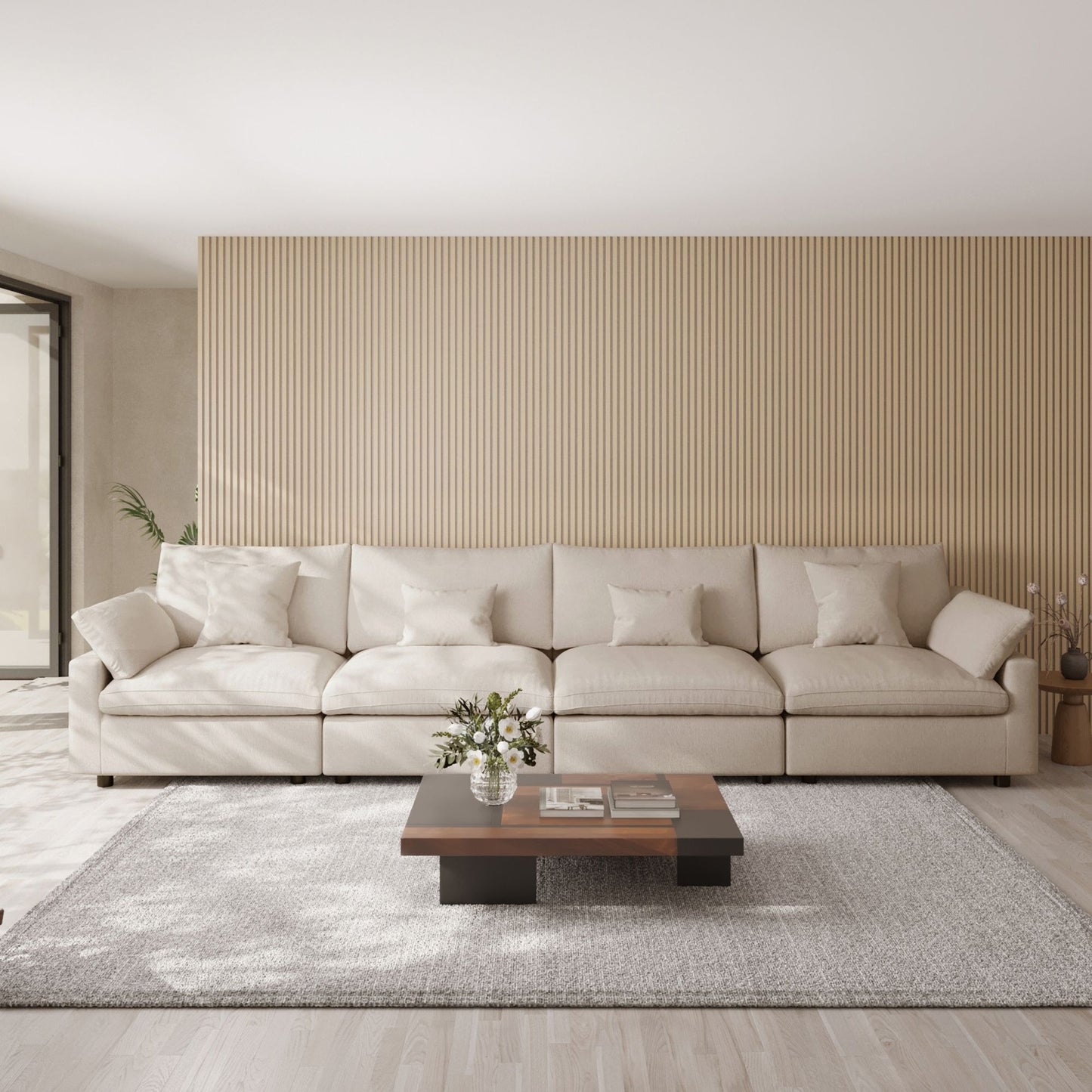 Khaki 4-seat sectional sofa in a modern living room with a coffee table and decorative elements.