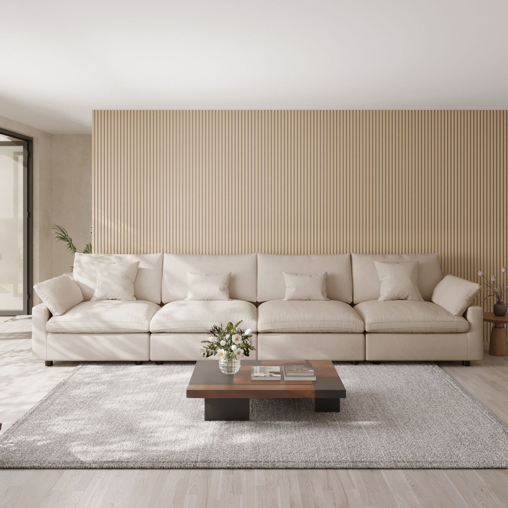 Khaki 4-seat sectional sofa in a modern living room with a coffee table and decorative elements.