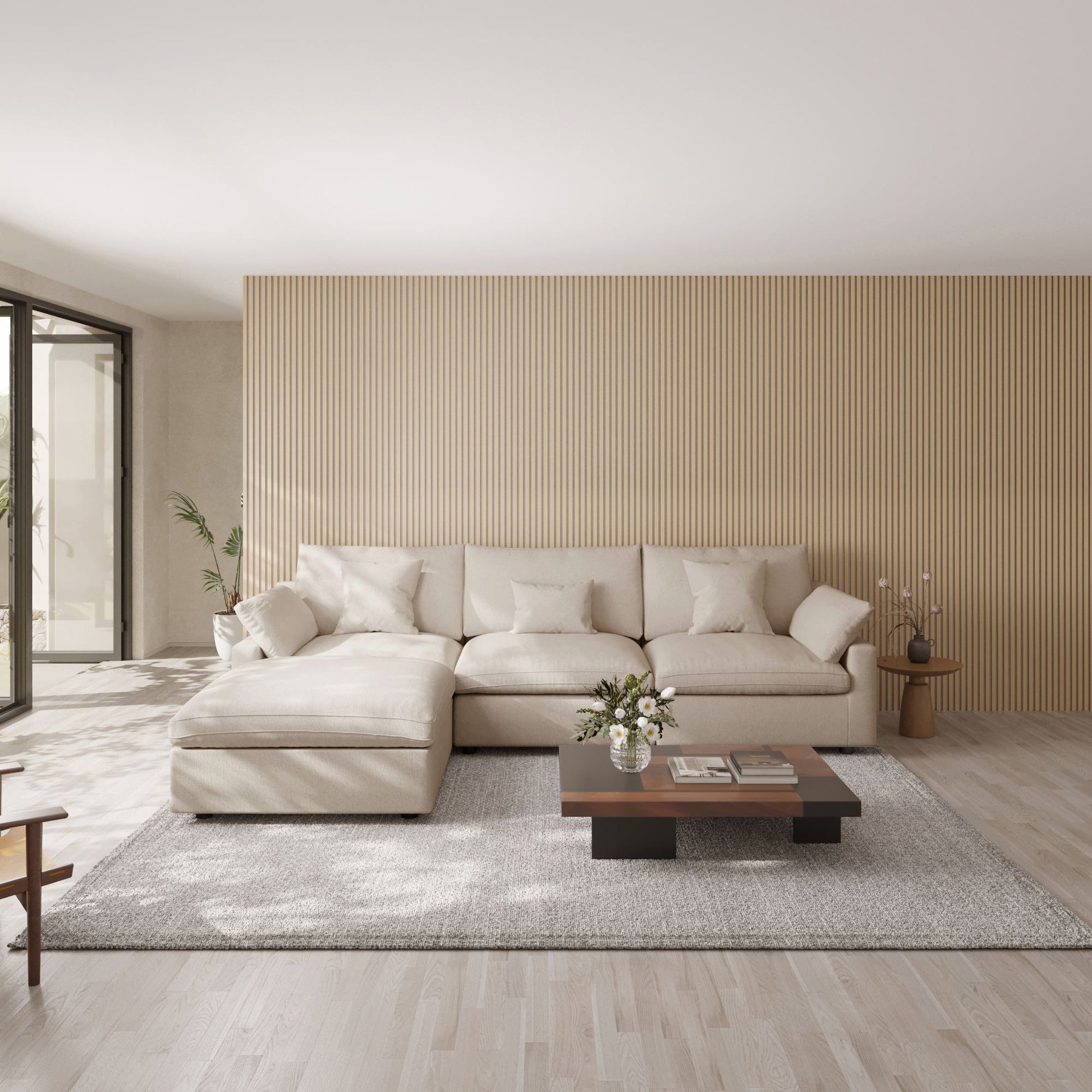 Modern living room with a khaki L-shaped sectional sofa, wooden coffee table, and striped wall.