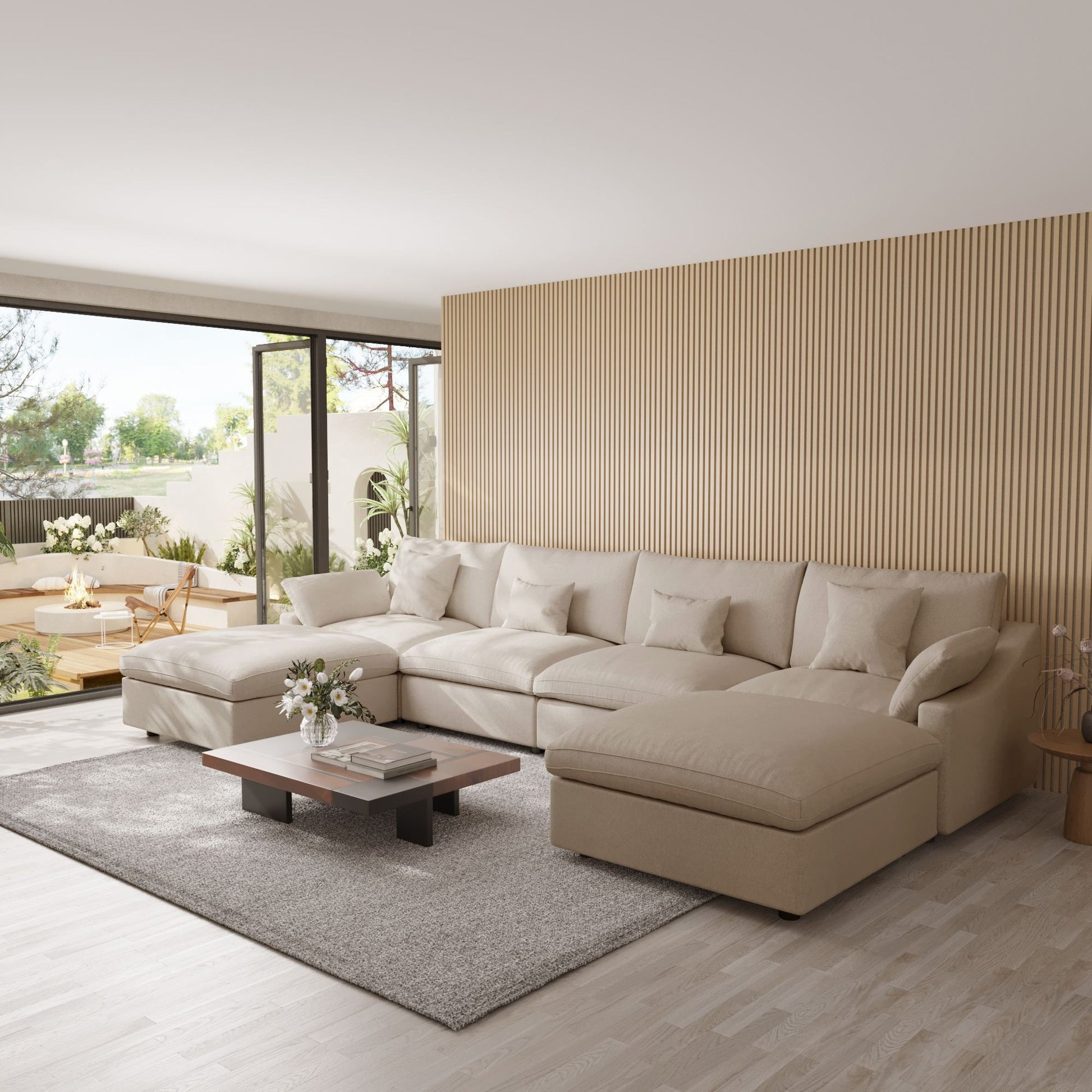 Khaki U-shaped sectional sofa in a modern living room with large windows and a striped wall.