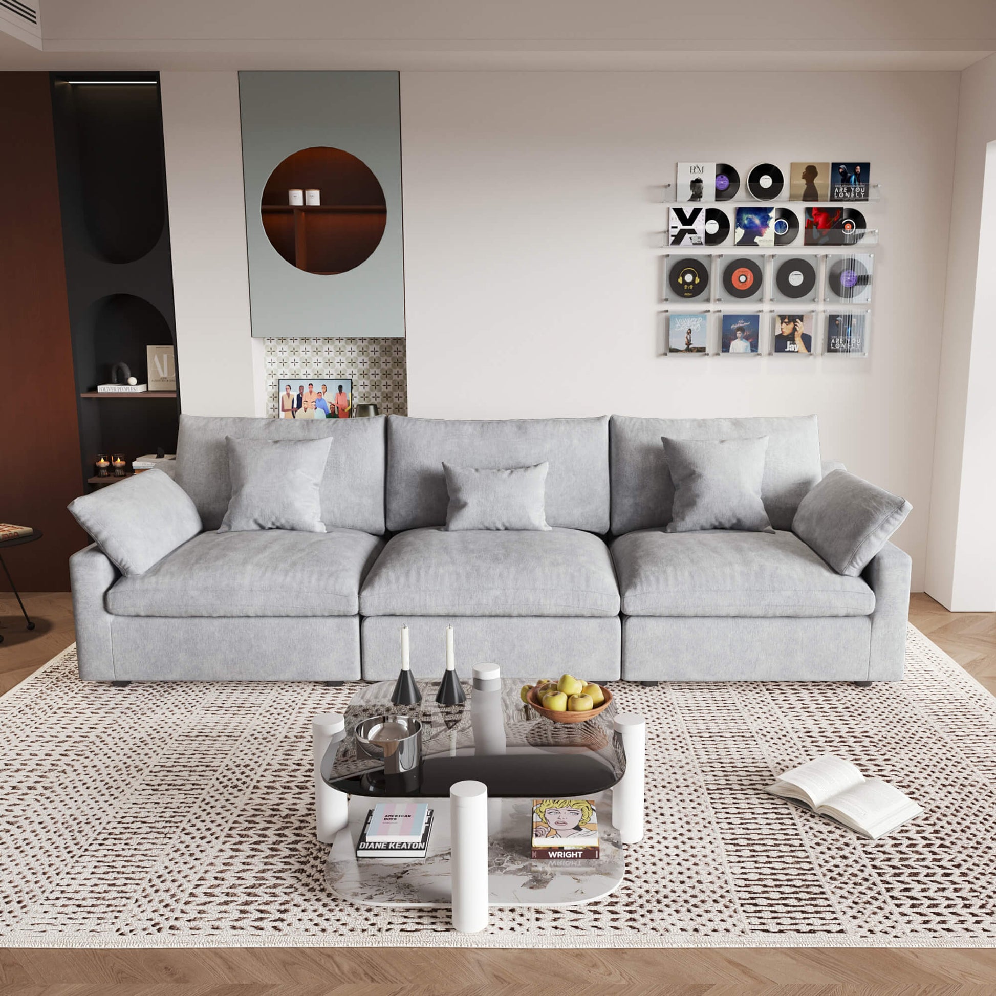 A modern light gray 3-seater sectional sofa with washable cushions and pillow covers, placed in a room with a minimalist design.