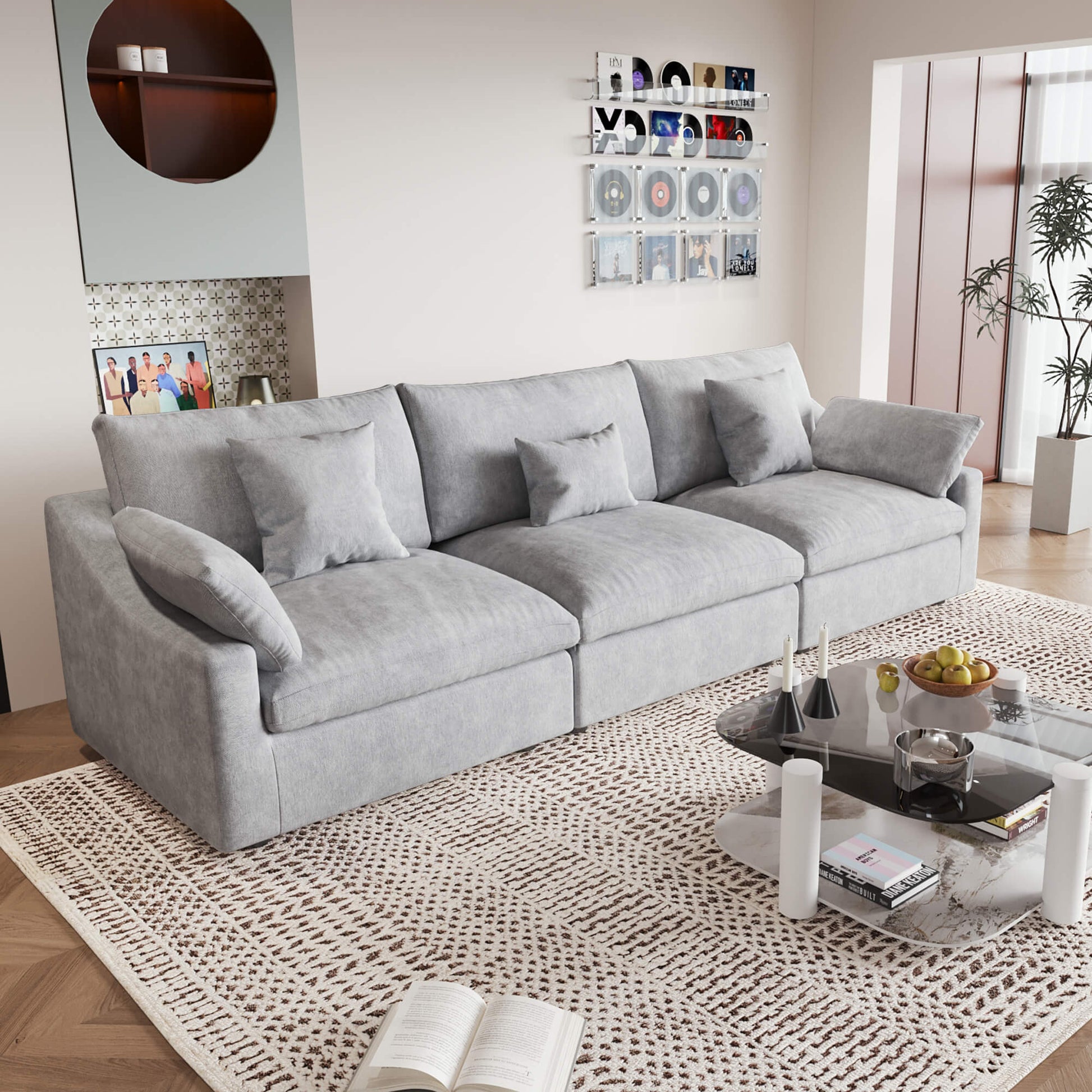 A modern light gray 3-seater sectional sofa with washable cushions and pillow covers, placed in a room with a minimalist design.