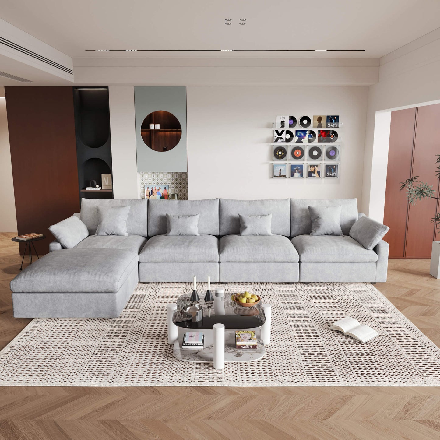 A large, light gray washable cloud 5-seat sectional sofa with removable cushions and an ottoman, placed in a living room setting.