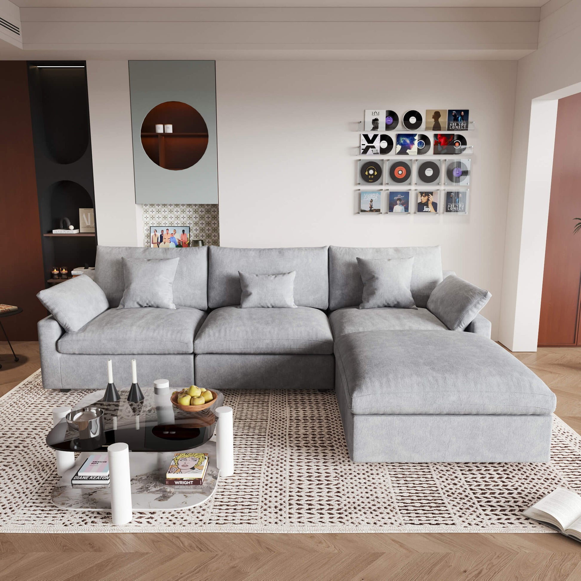An L-shaped light gray sectional sofa with removable cushions and pillow covers, placed in a living room setting.