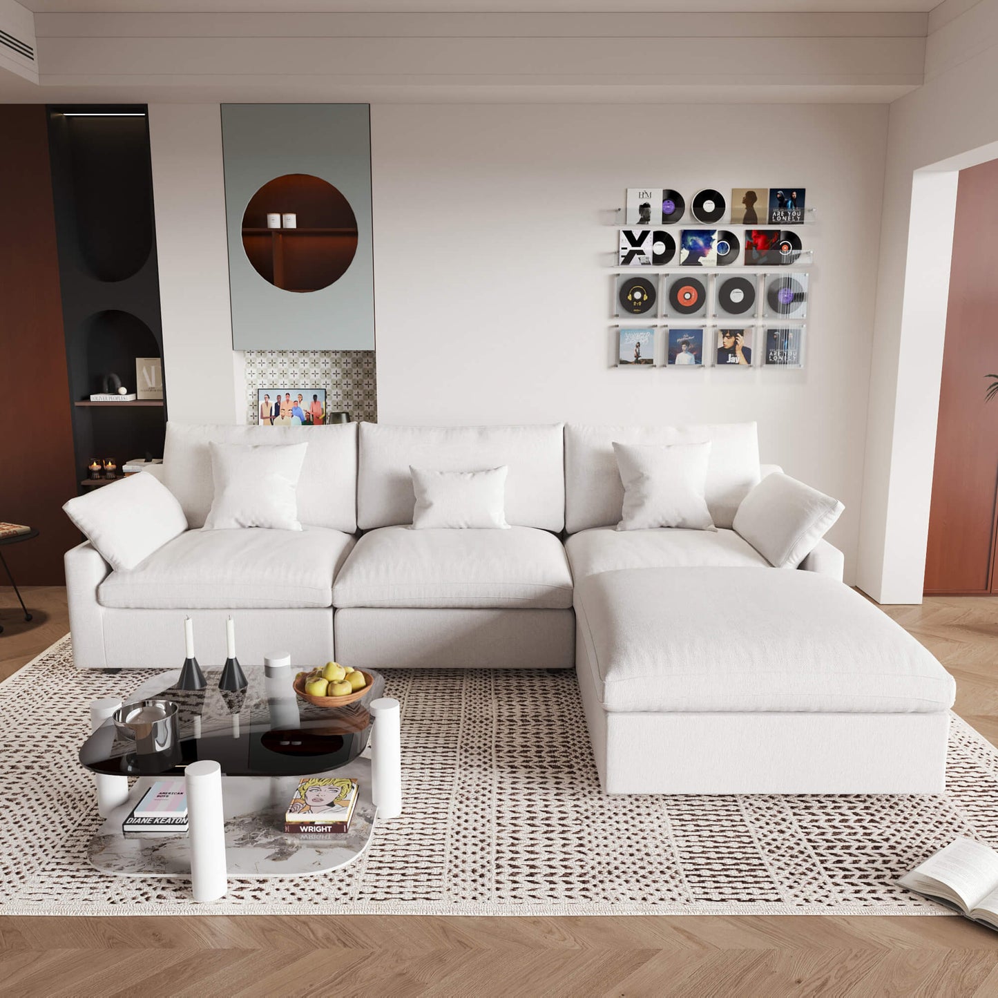 An L-shaped white sectional sofa with removable cushions and pillow covers, placed in a living room setting.