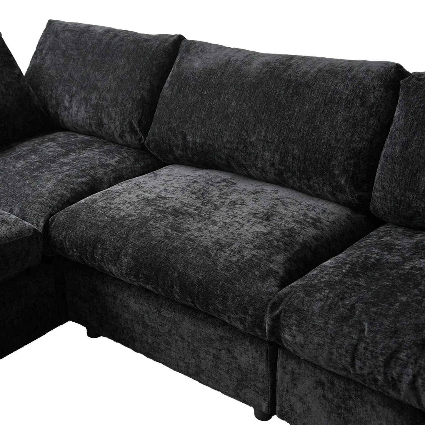 Black sectional sofa on a white background