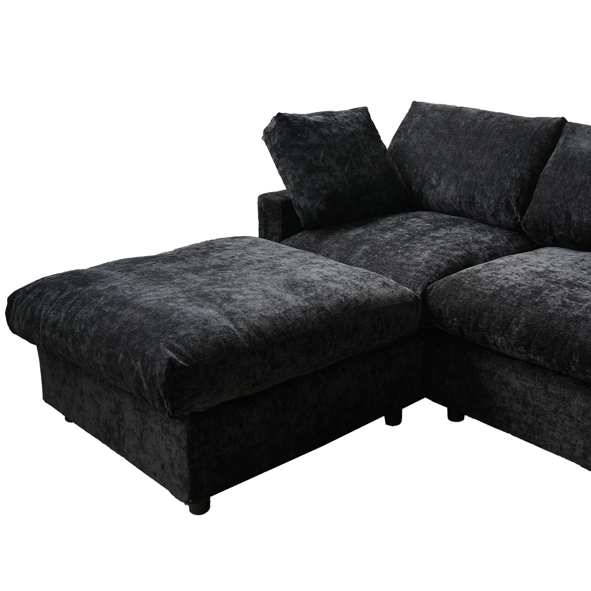 Black sectional sofa on a white background