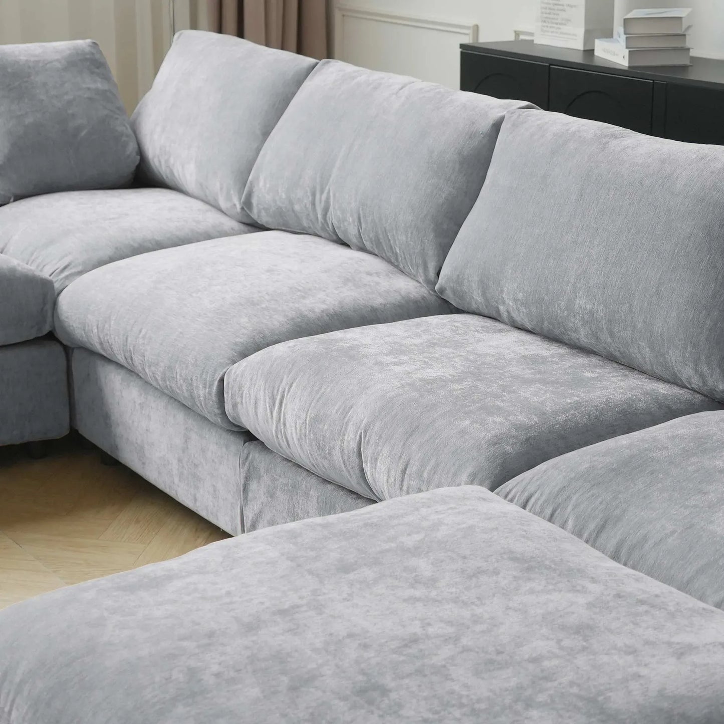 Gray sectional sofa in a living room setting
