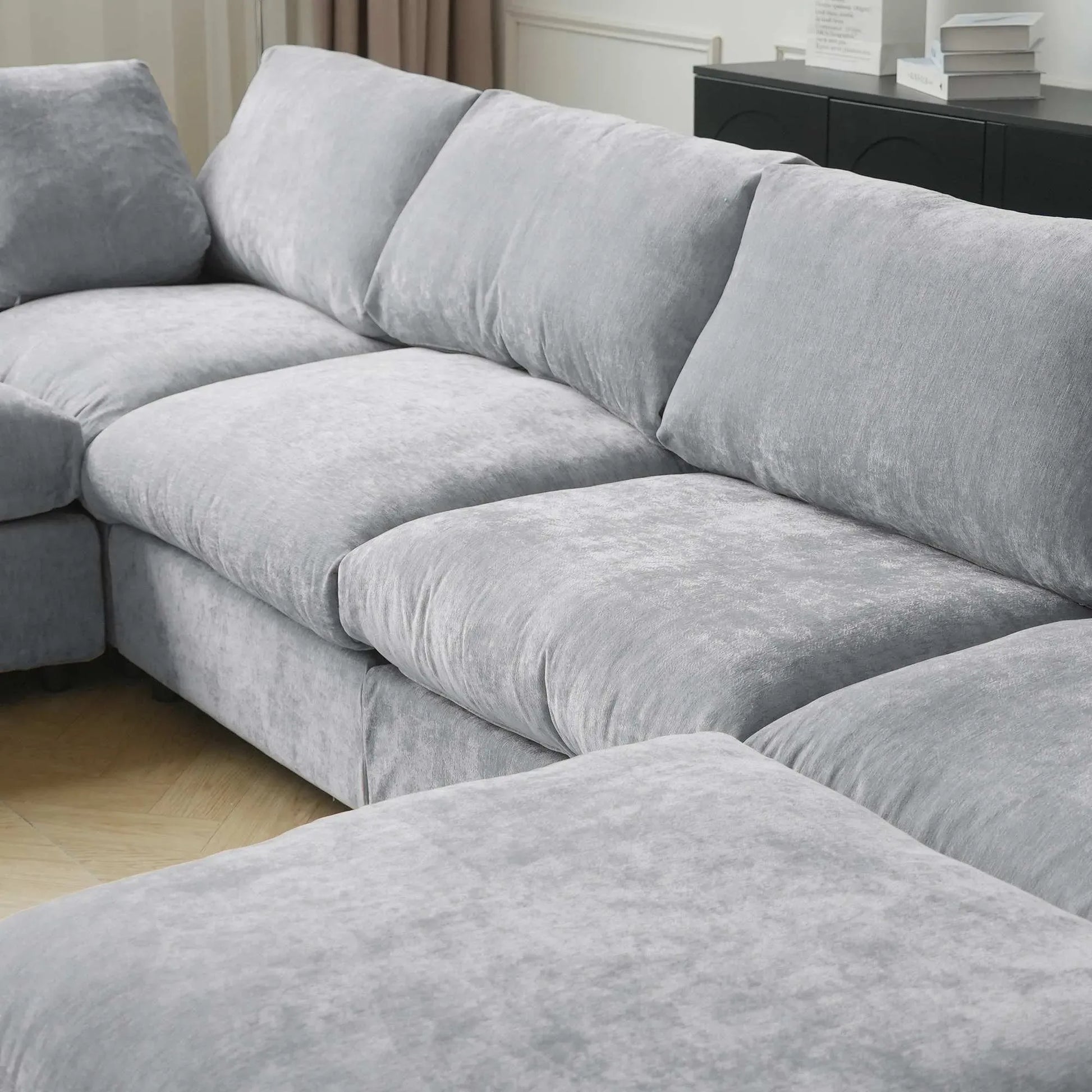 Gray sectional sofa in a living room setting