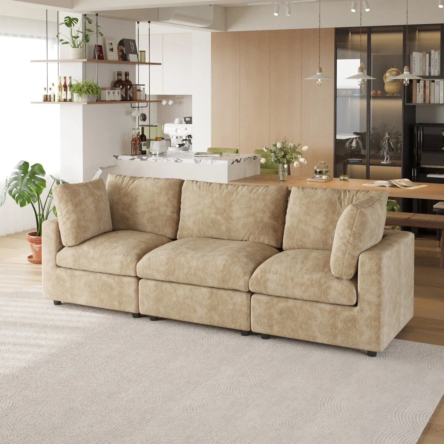 Khaki 3-seater sofa in a modern living room with a kitchen in the background