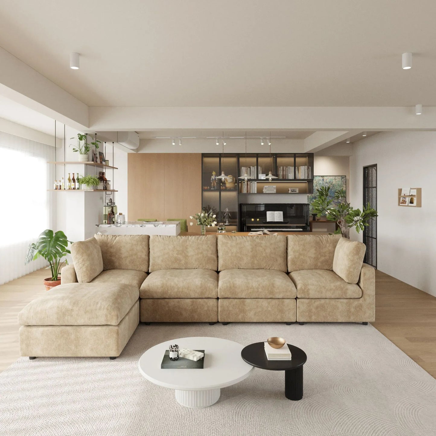 Modern living room with khaki L-shaped 5-seater sectional sofa, coffee table, and kitchen in the background.