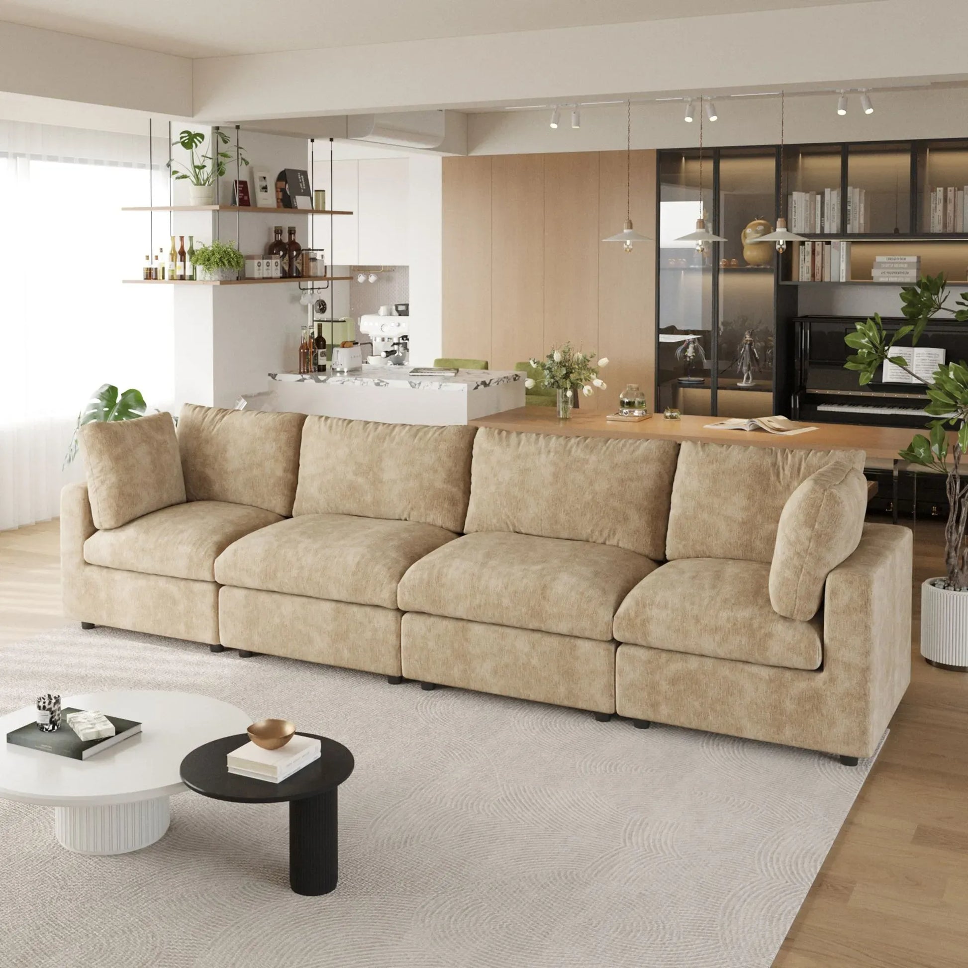 Khaki 4-seater sectional sofa in a modern living room with kitchen in the background