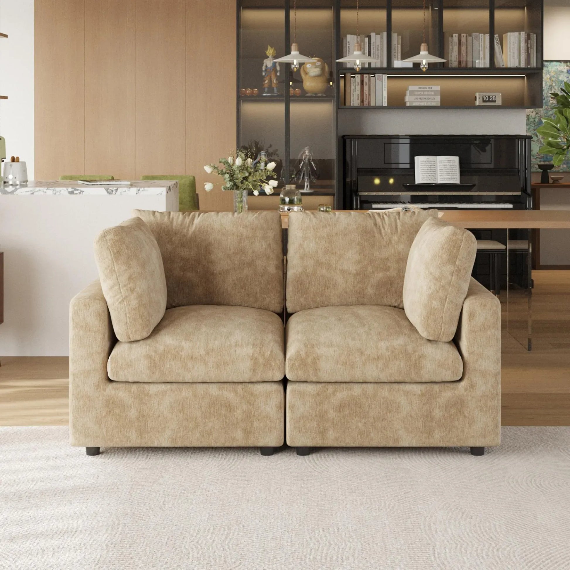 Khaki sofa in a living room setting with a piano and bookshelf in the background.