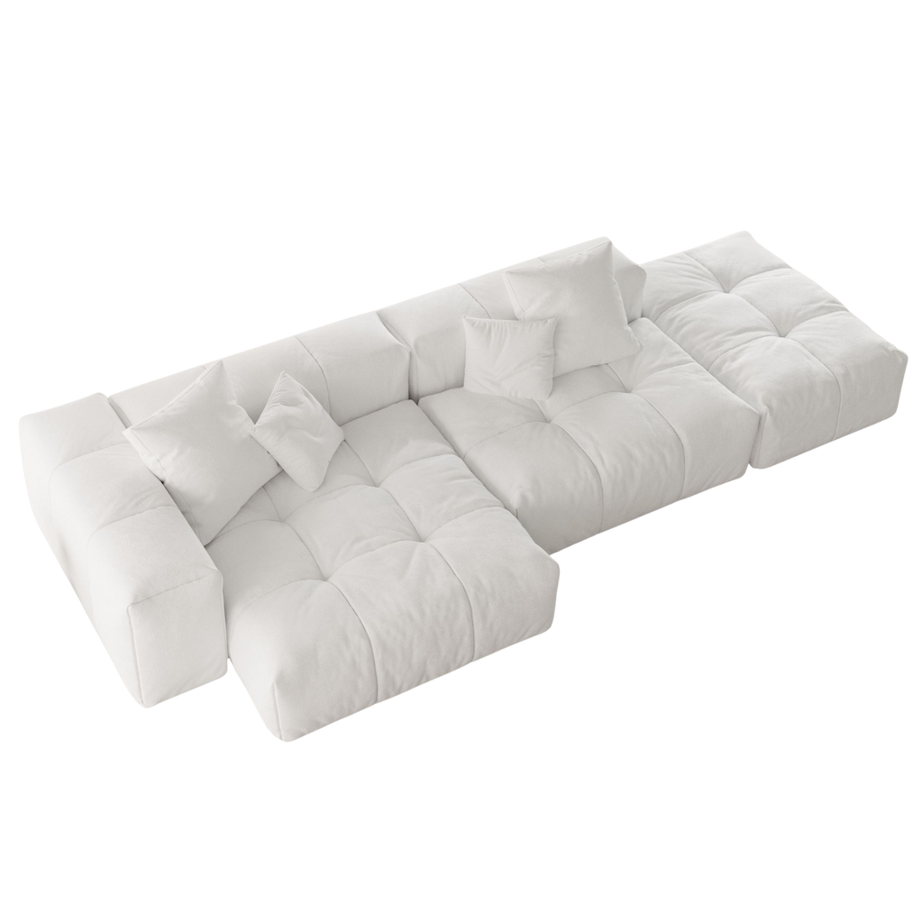 White sofa with cushions on a white background