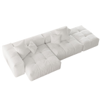 White sofa with cushions on a white background