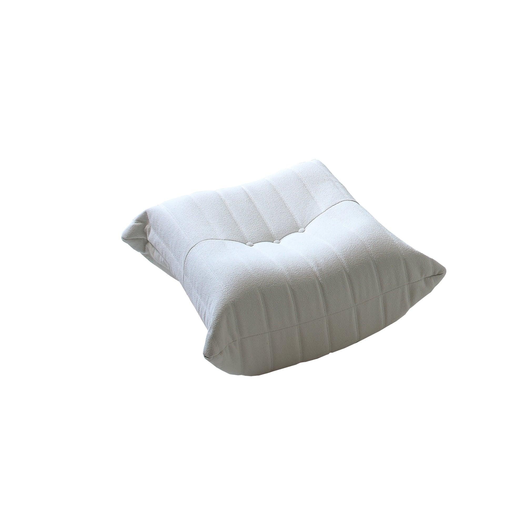 A distinctive caterpillar-shaped white upholstered ottoman with a soft, plush appearance.