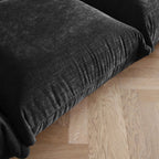 Black overstuffed chenille armchair seat detail