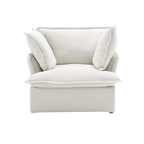 White armchair with cushions on a white background