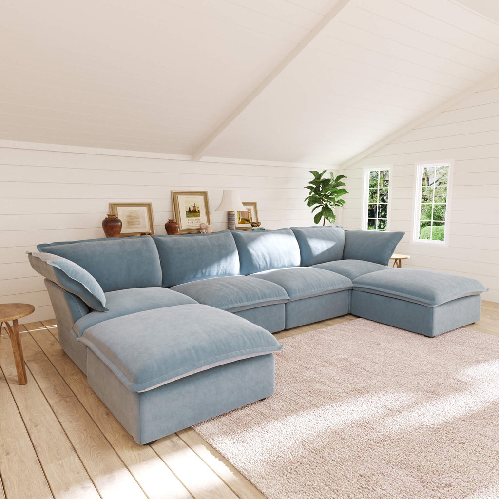 Baby blue performance velvet 4-seater double chaise sectional with replaceable covers.