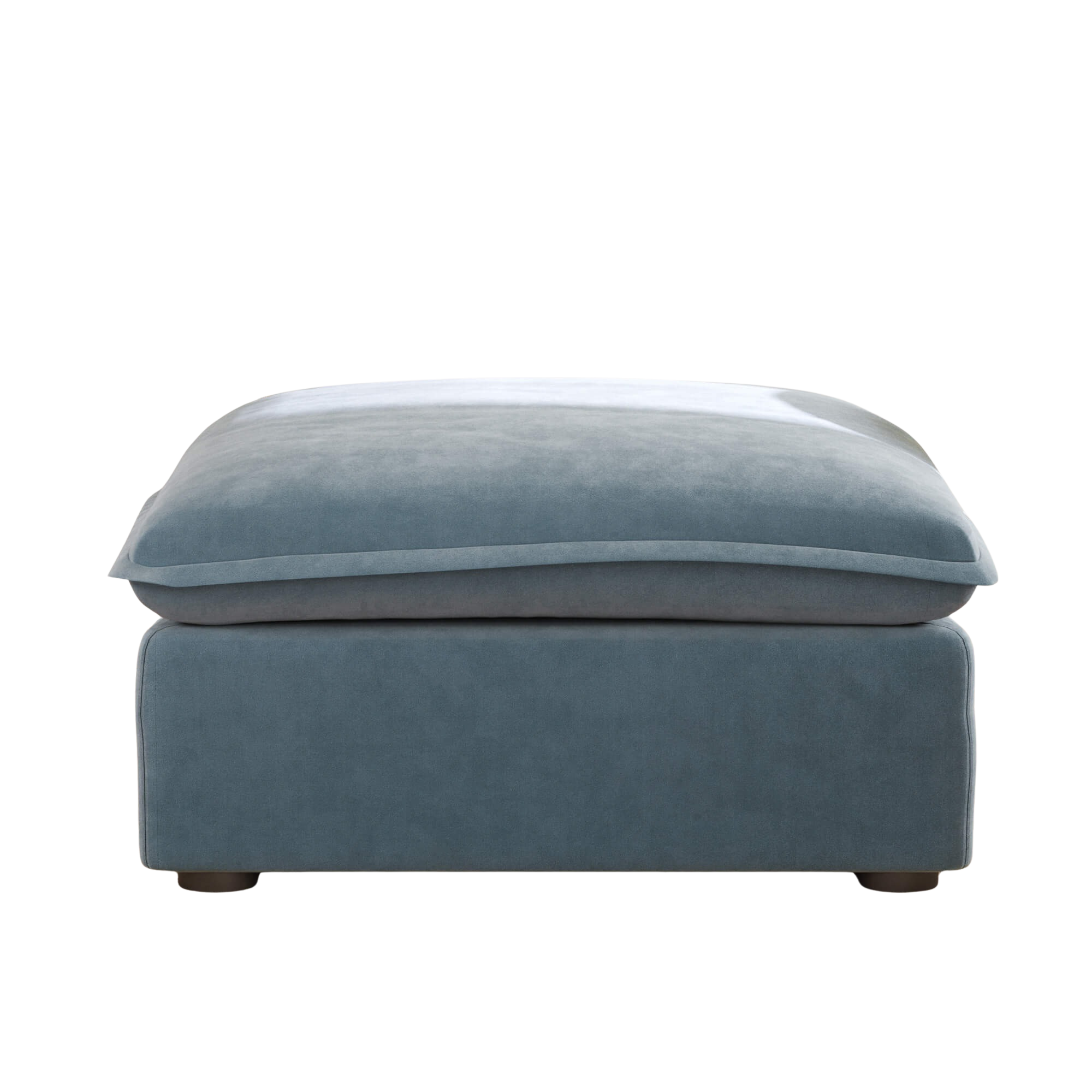 Baby blue ottoman with washable velvet covers, no background image.