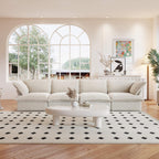 A beige linen 4-seat sectional sofa arranged in a living room setting with deep seating.