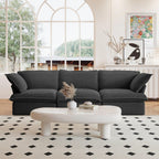 A black 3-seater linen sectional sofa in a modern living room setting with deep seating.