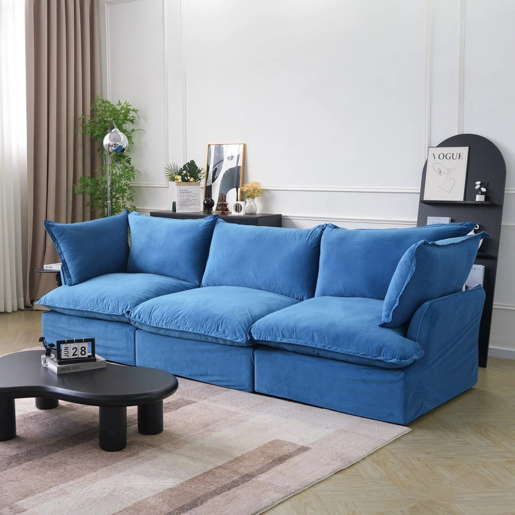 Washable 3-seater couch with flared arms and removable covers, side view.