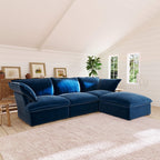 Dark blue L-shaped 4 -seater sectional sofa in a living room with white walls and wooden floor.