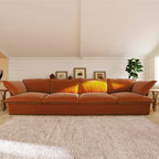 Dark orange 4-seat sectional sofa in a living room with a neutral color palette