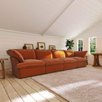 Dark orange 4-seat sectional sofa in a room with wooden floor and white walls