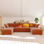 Dark orange U-shaped sectional sofa in a living room with light wood floors and white walls.