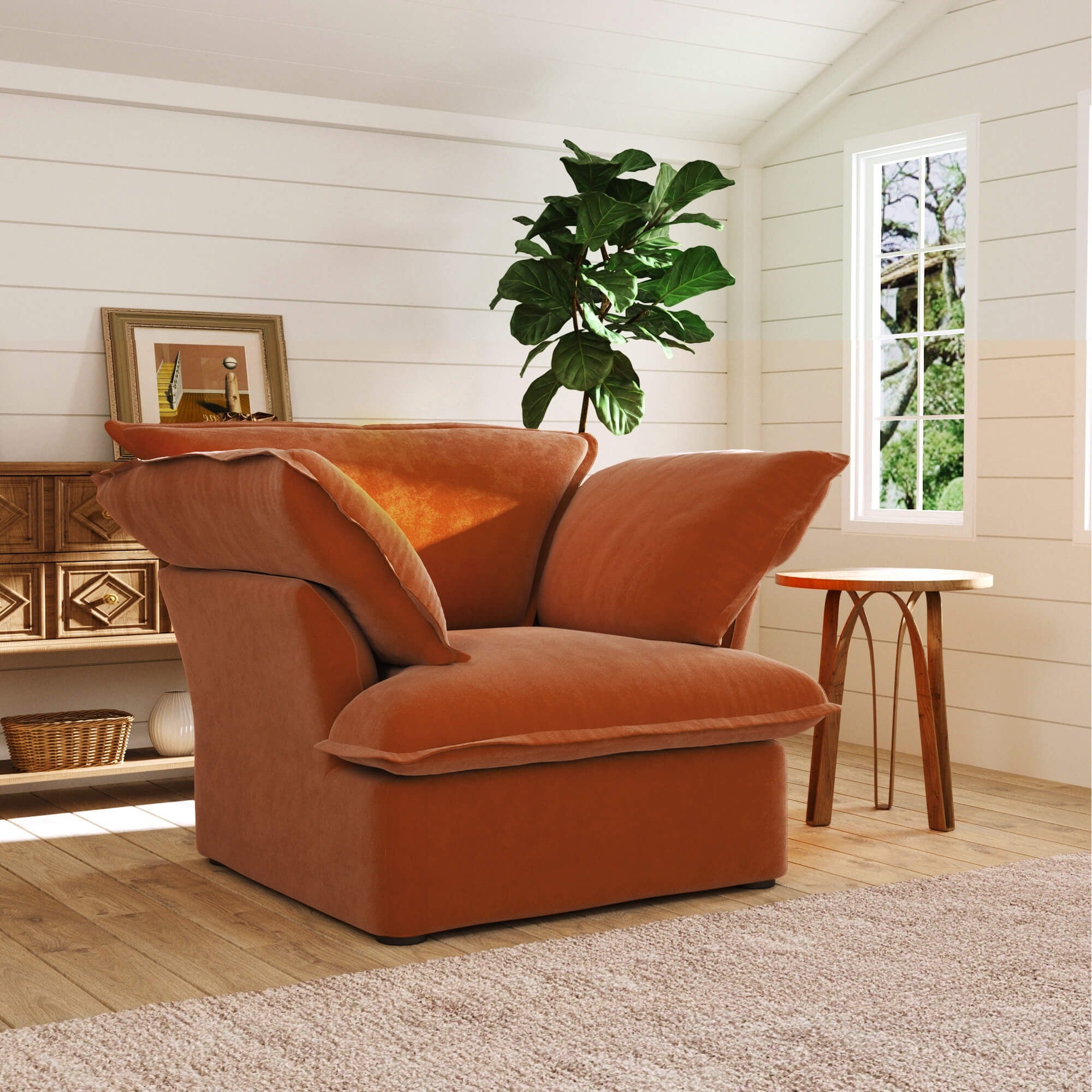 Dark orange armchair in a room with a plant and window