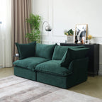 Velvet washable loveseat with flared arms in green.