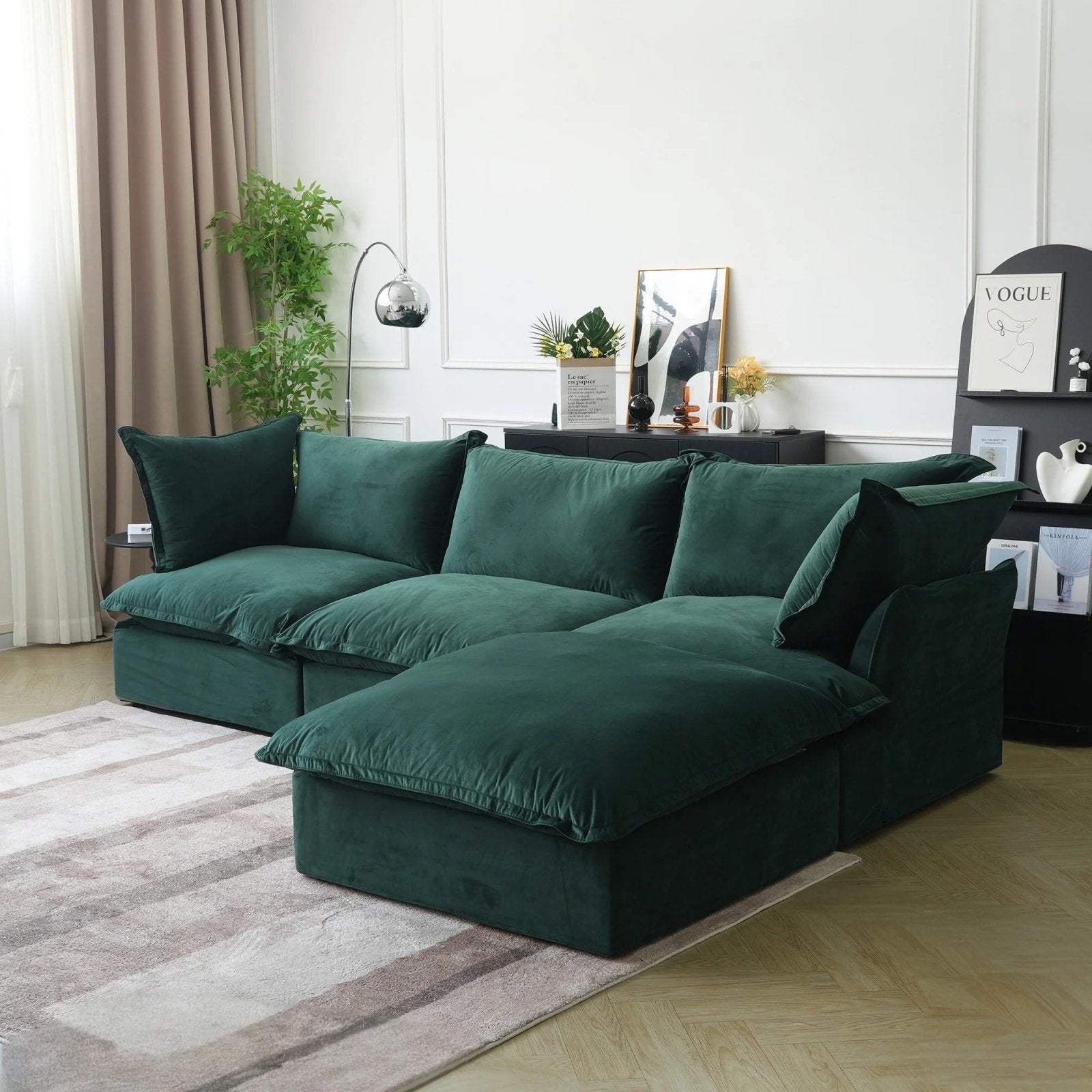 Washable 3-seater L-shaped sectional sofa with storage ottoman in green velvet.