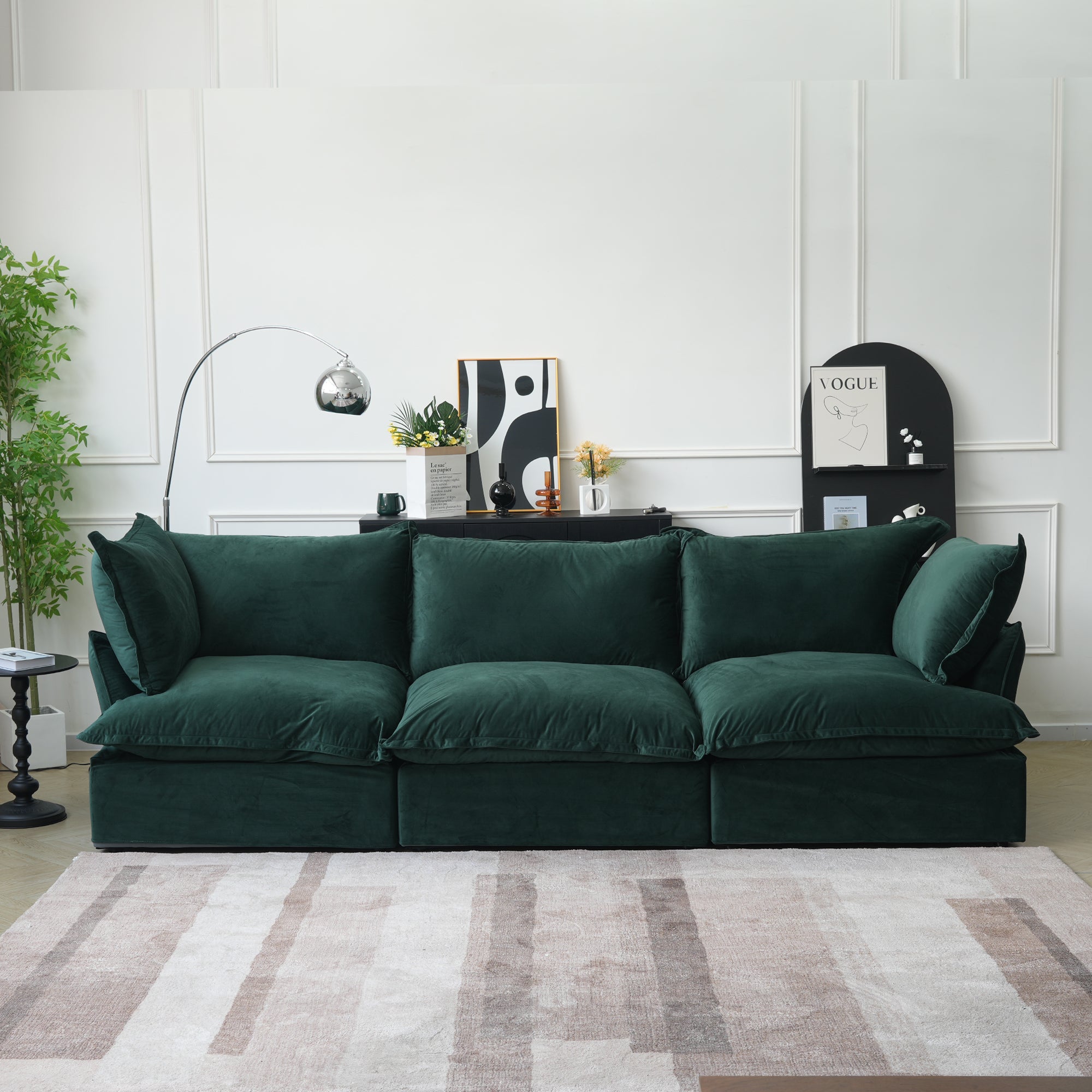 Green 3-seat sectional sofa in a light modern living room